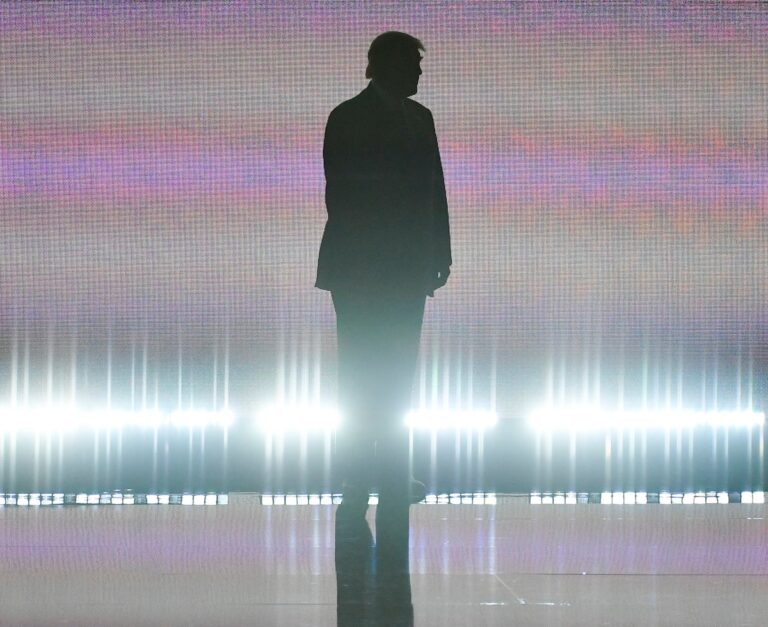 Donald Trump silhouette with digital backdrop